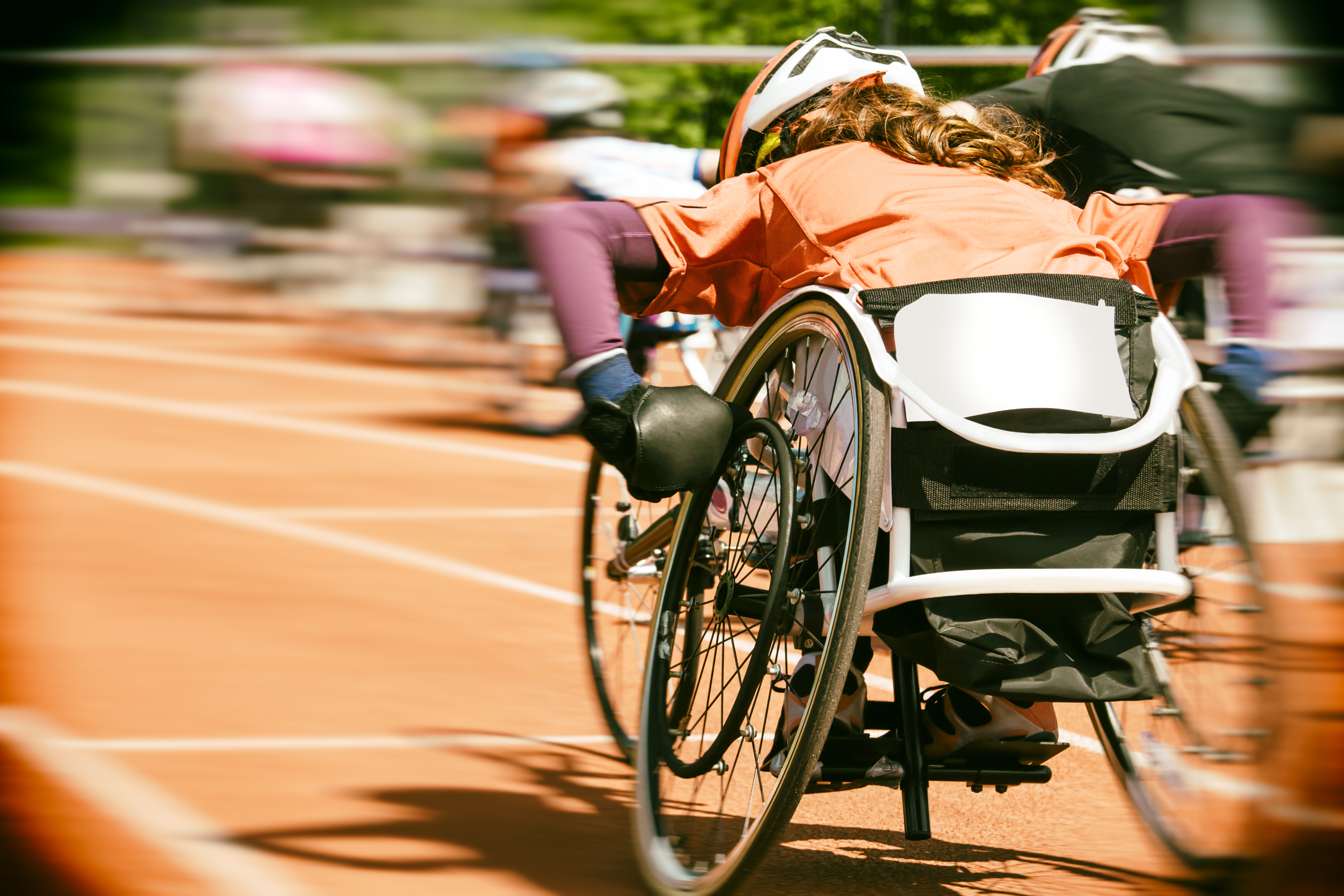 Person in wheelchair racing in an event