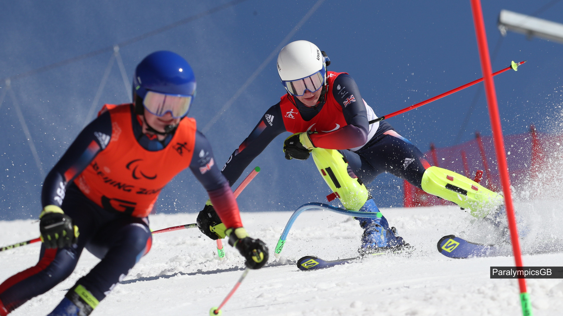 Visually impaired skier and their guide skiing at the Paralympics. Image taken by ParalympicsGB