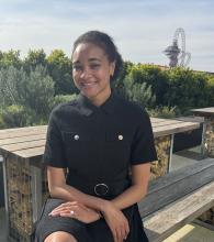 Alice Dearing sitting down outside